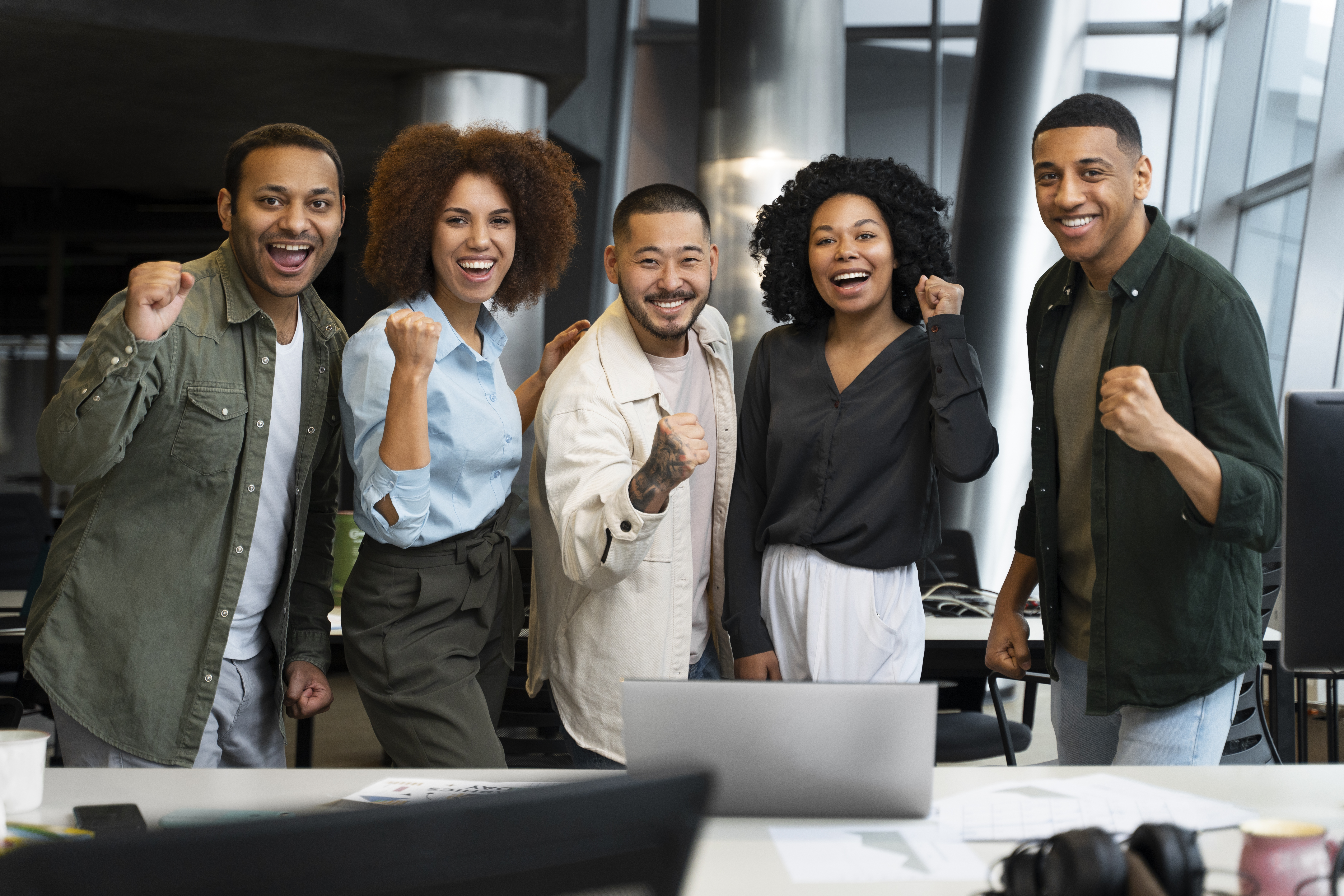 A diverse group of professionals posing